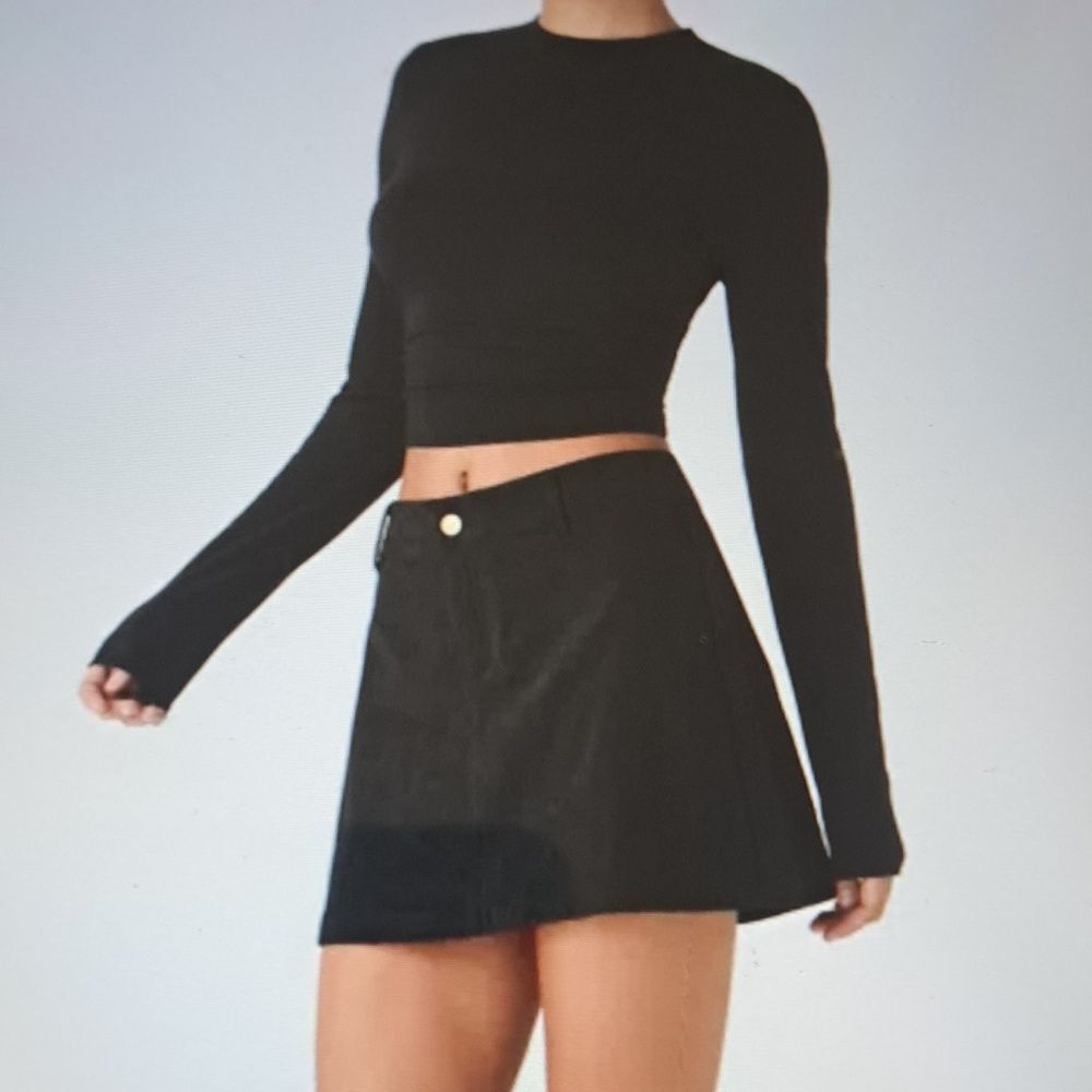 MEDIUM. HALARA LOW RISE BUTTON / ZIPPER 2 IN 1 CORDUROY SKORT - Picture 1 of 8